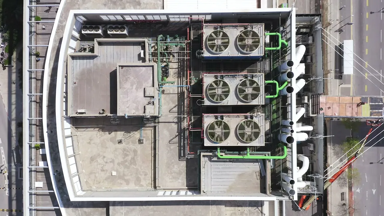 Technician servicing an air-conditioning unit